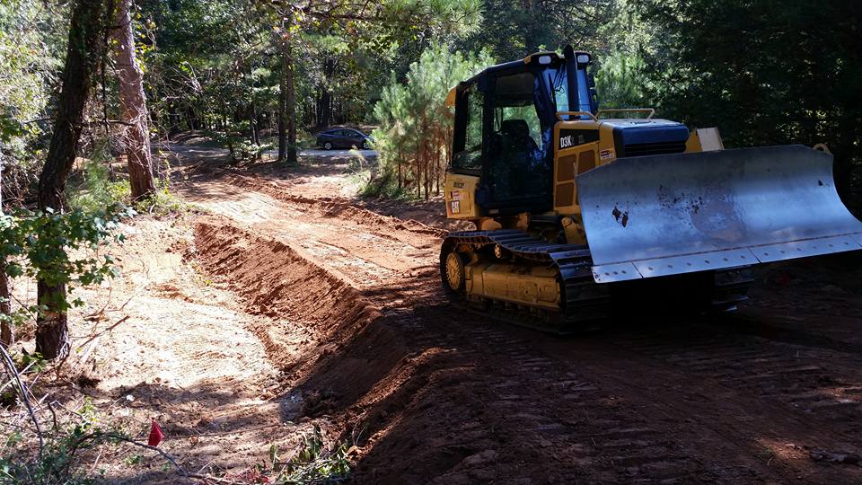 Dozer spreading fill dirt