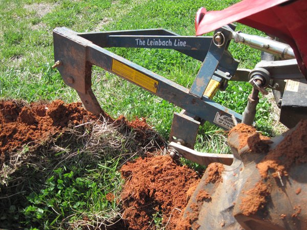 Breaking sod with a bottom plow